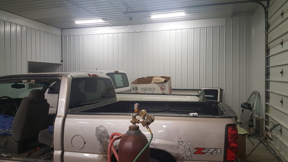 Door dent repair at Gurden's Body Shop, Cadillac, MI